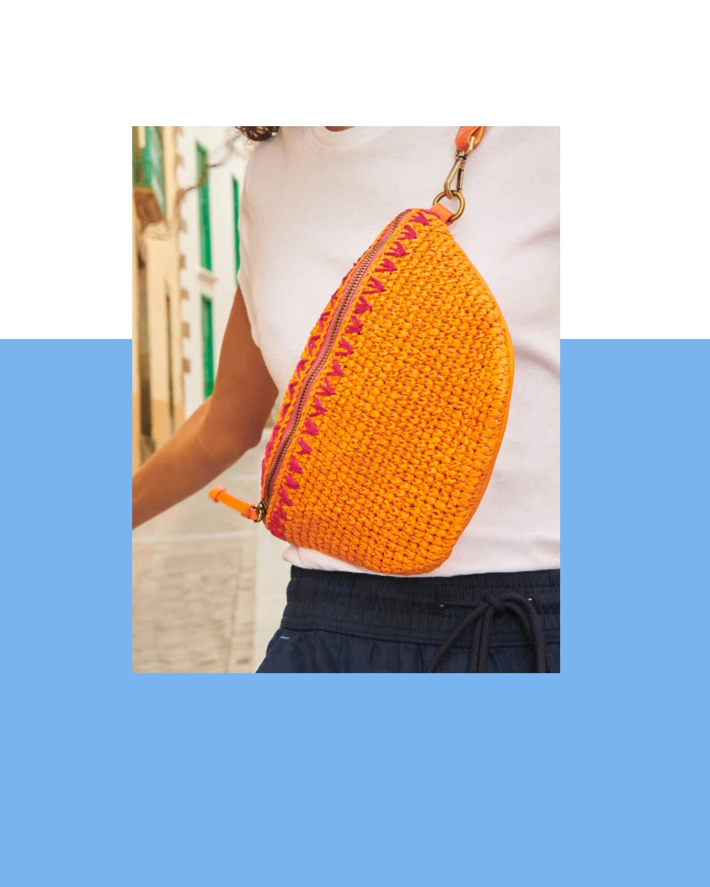 closeup of orange crochet bag